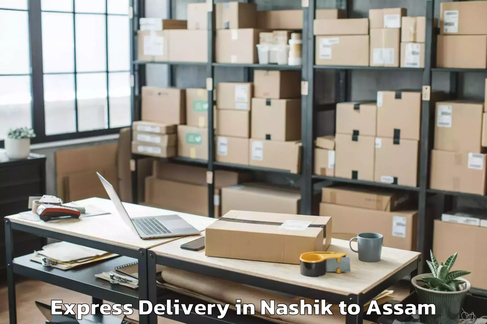 Book Nashik to Sualkuchi Express Delivery Online